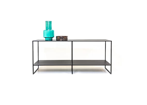 Black steel console table with a minimal design