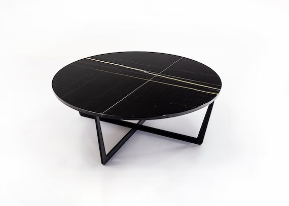 round coffee table, with Sahara Noir marble top