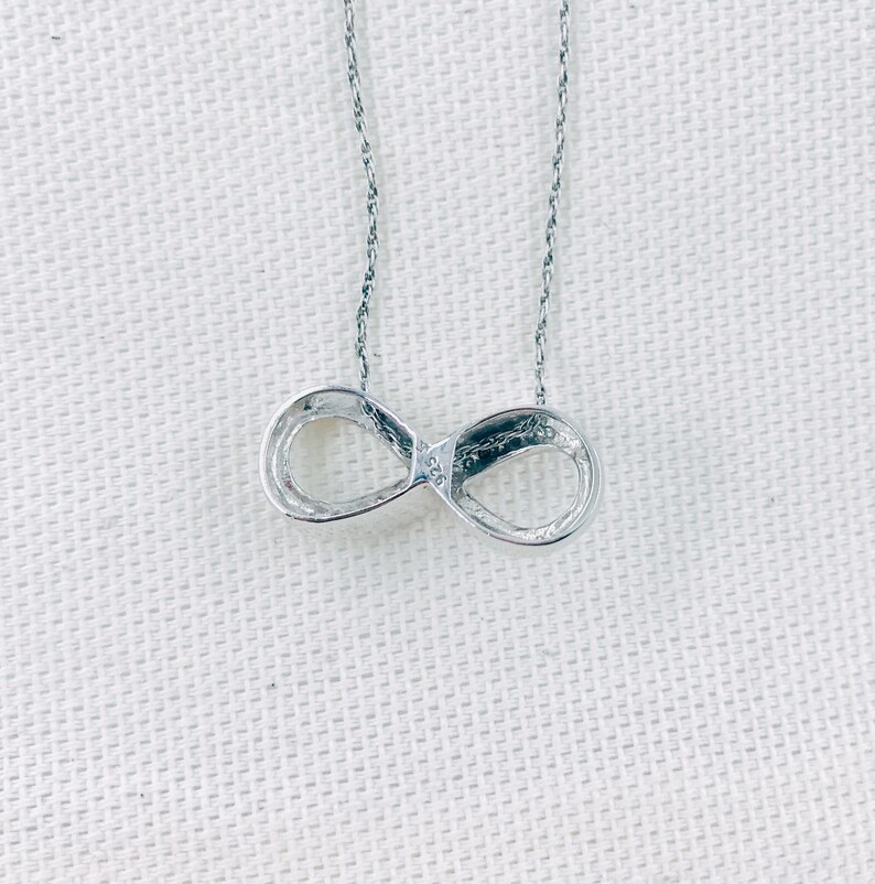Infinity Pendant in Sterling Silver