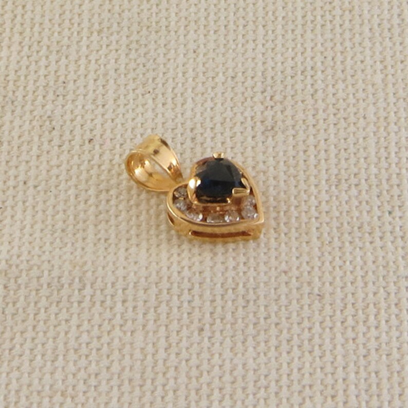 Dainty Blue Sapphire and Diamond Heart Pendant in 14K Yellow Gold