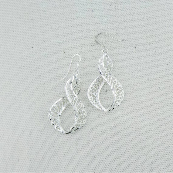 old school figure 8 earrings