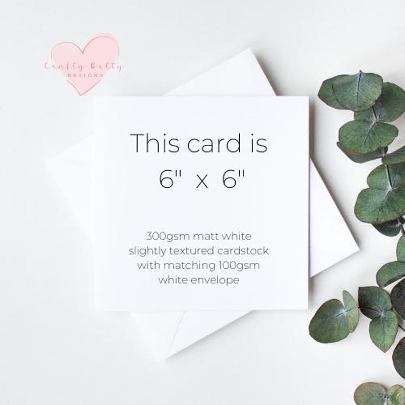 Puede incluir: Una tarjeta blanca con el texto "This card is 6" x 6" 300gsm matt white slightly textured cardstock with matching 100gsm white envelope".