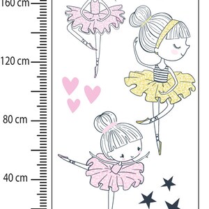 May include: Three illustrations of ballerinas in pink and yellow tutus with glitter accents. The ballerinas are surrounded by pink hearts and gold stars.
