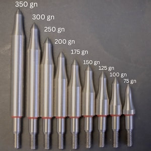 May include: Nine silver arrowheads of different sizes, each with a pointed tip and a threaded base. The arrowheads are labelled with their grain weight, from 75 gn to 350 gn. Each arrowhead has a red ring near the base.