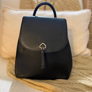 black leather backpack round flap CHANEL Vintage Quilted Caviar Crossbody Bag a plush signature lining provides a cozy sanctuary for your belongings Round Grained Neo Capsule Black