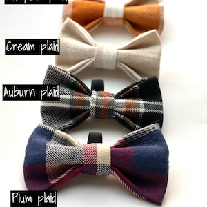 May include: Four plaid bow ties in different colors: pumpkin, cream, auburn, and plum.