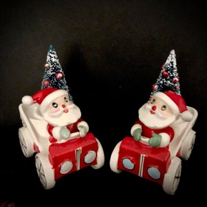 Holt Howard Vintage Christmas Santas in their Jalopy Sleighs candlesticks with bottlebrush trees Santa sleigh car MCM midcentury