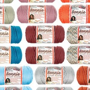 May include: A collection of 10 spools of Bonnie Craft Cord in various colors, including teal, gray, red, orange, and brown. Each spool is labeled with the brand name, "Bonnie Craft Cord", and the size, "4 mm 100 yd/90 m".
