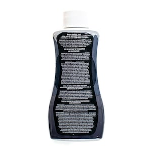 May include: A black bottle of fabric dye with instructions for use on the back. The bottle is labeled "Dye", and the instructions include information about pre-washing fabric, dyeing temperature, and dye retention.