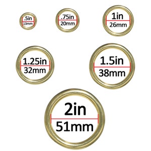 May include: Set of six gold-colored metal rings in various sizes. The rings are labeled with their diameter in inches and millimeters. The rings are 0.5 inches (13 mm), 0.75 inches (20 mm), 1 inch (26 mm), 1.25 inches (32 mm), 1.5 inches (38 mm), and 2 inches (51 mm).