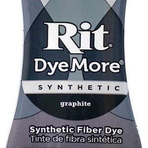 May include: A bottle of Rit DyeMore Synthetic dye in graphite color. The bottle is 7.0 fl oz (207 ml) and is labeled for use on polyester, nylon, and acrylic fabrics. The label also includes safety warnings in English and Spanish.