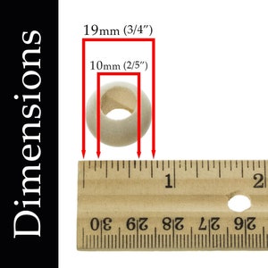 May include: A white wooden ring with a 3/4 inch (19 mm) outer diameter and a 2/5 inch (10 mm) inner diameter. The ring is measured against a wooden ruler.