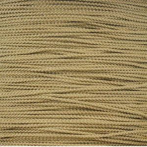Puede incluir: Primer plano de un carrete de cord&oacute;n de color beige.