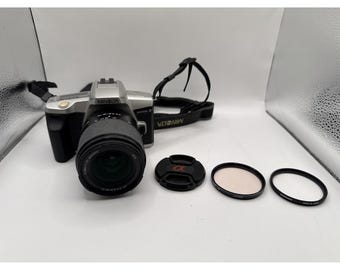 Minolta Maxxum 3 35mm SLR Film Camera w/ Sony 18-70 DT Lens & 2 Filters