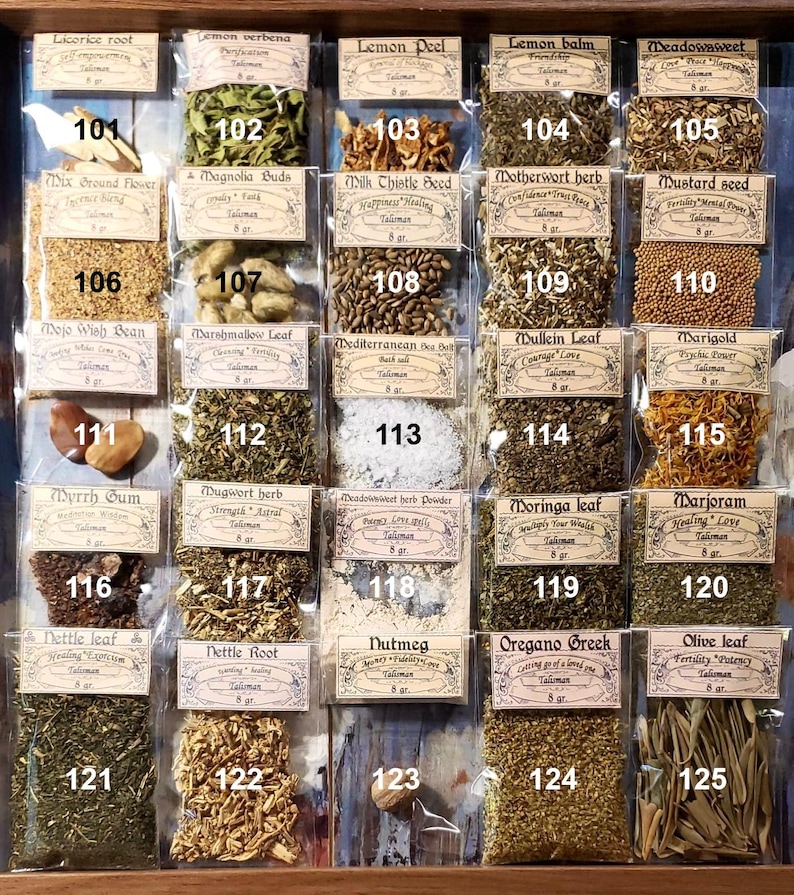 May include: A display cabinet with numerous small bags of dried herbs and spices. Each bag is labelled with the herb's name and weight in grams. Herbs include licorice root, lemon verbena, and marigold. A variety of culinary and medicinal herbs.