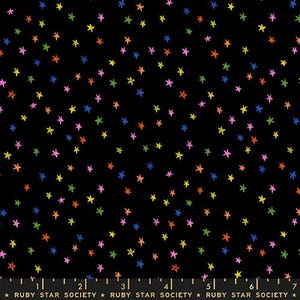 May include: Black fabric with a scattered pattern of colorful stars in shades of pink, orange, yellow, green, and blue. The stars are hand-drawn in a whimsical style. The text "RUBY STAR SOCIETY" is at the bottom.