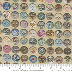 May include: A beige fabric with a repeating pattern of round buttons. Each button has a different design, including numbers, letters, and images. The fabric is 7 inches wide and has a ruler at the bottom.