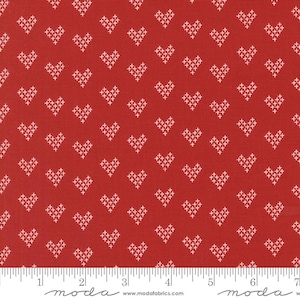 May include: Red fabric with a white heart pattern. The hearts are stitched in a cross-stitch style.