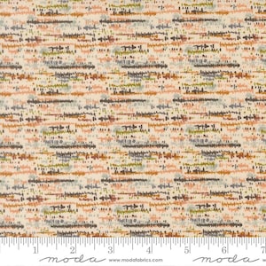 May include: A light cream fabric featuring a repeating horizontal pattern of dashed lines and small marks in shades of dark brown, burnt orange, olive green, and soft grey. A white ruler is visible at the bottom with the text moda fabrics.