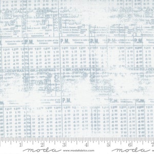 May include: A white fabric with a blue printed design of a train schedule. The fabric has a distressed look and includes the text "GR.6 CENTRAL" and "P.M.".