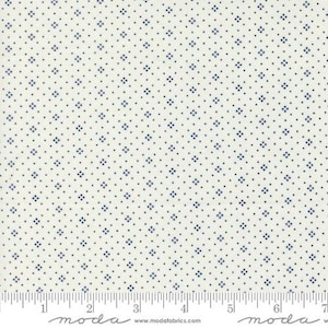May include: White fabric with a small blue diamond pattern. The fabric is measured in inches with a ruler.