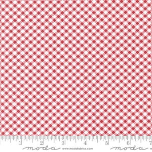 May include: Red and white gingham fabric with a small checkered pattern. The fabric is shown with a ruler measuring 7 inches.