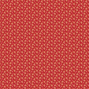 May include: A vibrant red fabric featuring a repeating pattern of small, light brown gingerbread men and tiny white snowflakes scattered across the surface. The design is dense and uniform, creating a festive, seasonal textile print.