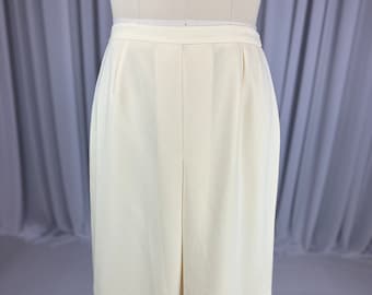 1980s Light Yellow Ladies A Line Front Pleat Polyester Skirt Size Large Waist 32"