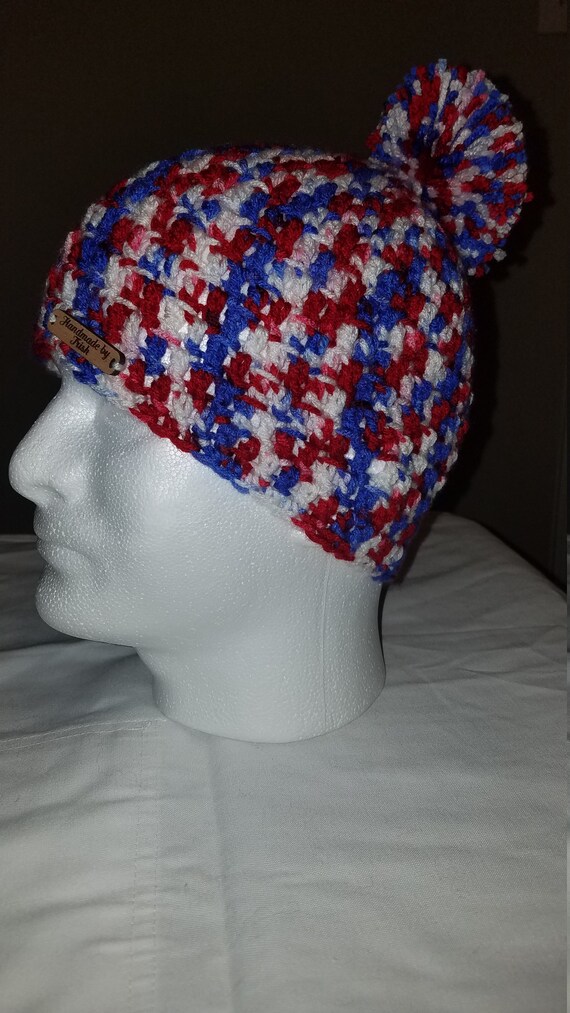 ball on top of winter hat
