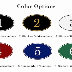 May include: Six oval-shaped signs with different color backgrounds and white or gold numbers. The signs are numbered 1 through 6. The colors are black, gold, white, red, blue, and green.