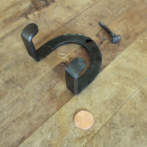 Soporte para colgar martillo de guerra