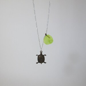 Brass &quot;Turtle Treat&quot; Necklace with Glass Leaf on Silver