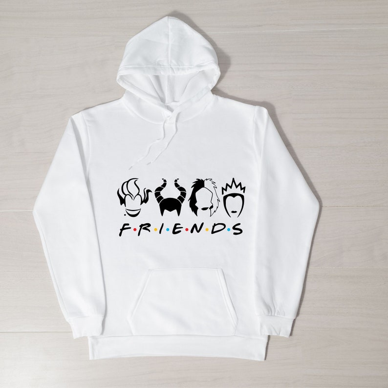 May include: White hooded sweatshirt with a black graphic of four Disney villain characters and the word "FRIENDS" in black with colorful dots.