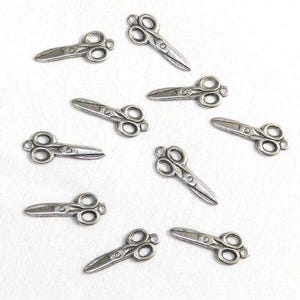25 pcs. of Tiny scissor charm, unpainted- Bin# 27