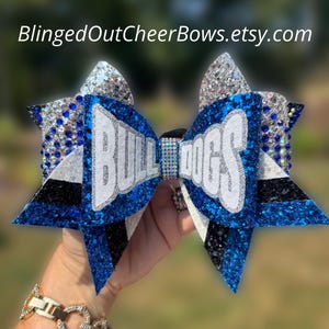 Team Orders Only, priced per bow, must order 10 or more bows.  Large 7&quot; cheer bow customizable with team name, your colors and rhinestones
