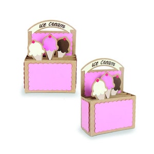 May include: Two brown cardboard ice cream stands with pink and white ice cream cones and the words "ice cream" on the top.
