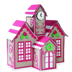 May include: A pink and white gingerbread house with a clock tower, green holly accents, and a wreath on the door.
