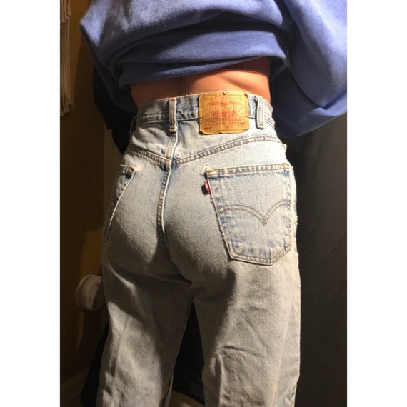 Vintage Levi’s 550 distressed high waisted mom jea