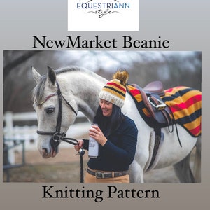 May include: A woman wearing a striped beanie with a pom pom is standing next to a white horse. The horse is wearing a saddle with a colorful saddle pad. The woman is holding a water bottle. The text "NewMarket Beanie" and "Knitting Pattern" is visible in the image.