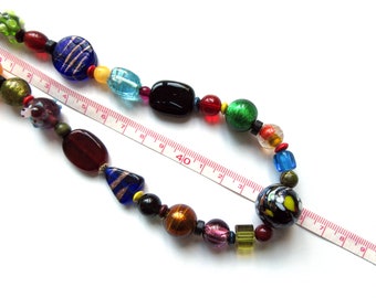 Long colorful material mix chain "RED ELEPHANT" made of glass beads, wooden beads, ceramics, ...