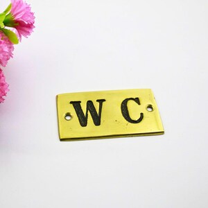 brass plate reading w.c.