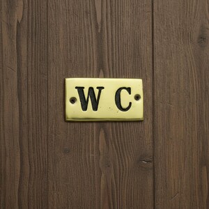brass plate reading w.c.
