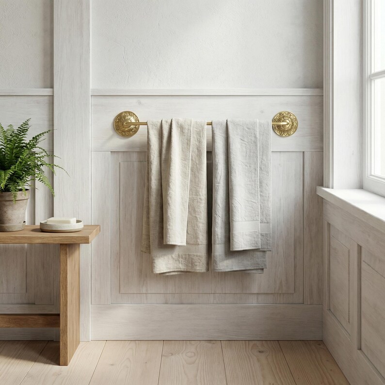 Minimal bathroom with wall mounted solid brass towel bar