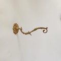 Brass Plant Hanger: Antique Style Wall Decor product logo