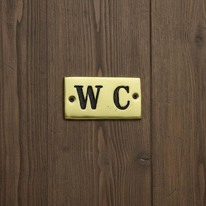 brass plate reading w.c.