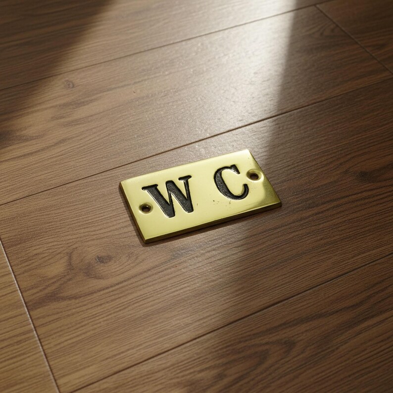 brass plate reading w.c.
