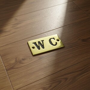 brass plate reading w.c.