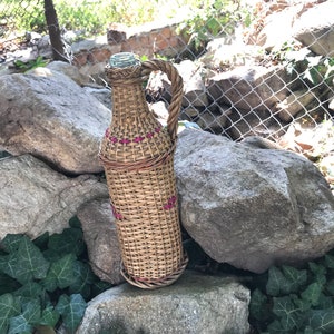 Vintage knitted bottle with cork plug -hand knitted bottle with wicker -rustic decorative wine bottle -old bottle -wicker woven glass bottle