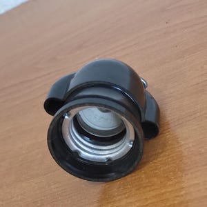 May include: A rustic wooden sign with the text "Welcome to our home" in white lettering. The sign features a distressed finish and a simple, inviting design, perfect for a front porch or entryway.