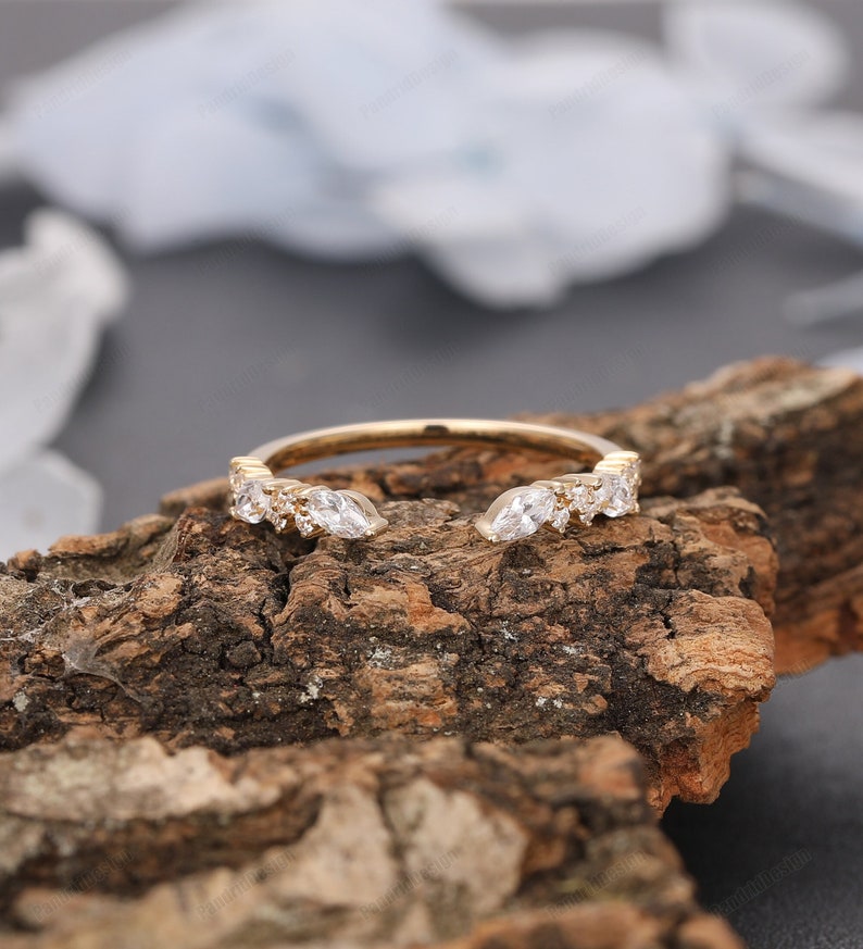 Elevate your jewelry collection with our beautiful Resizable Stacking Rings for Women. Expertly crafted from 18k solid gold, this minimalist band features a stunning moissanite that sparkles like a diamond, making it the perfect choice for a wedding ring band or everyday wear.